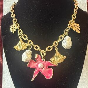 Gold and Pink Charm Necklace with Leaf Accents